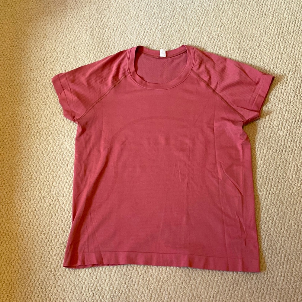 Lululemon size 10 Run Swiftly tech shorter shirt. Never worn. Couldn’t return